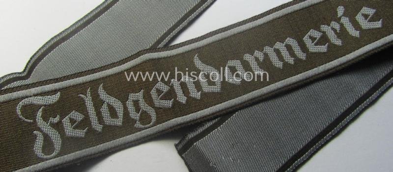 Hardly ie. never worn example of a WH (Heeres) cuff-title ie. armband (ie. 'Ärmelstreifen') entitled: 'Feldgendarmerie' (being a typical 'BeVo'-woven example) — image 3