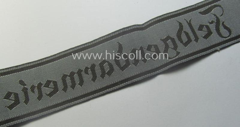 Hardly ie. never worn example of a WH (Heeres) cuff-title ie. armband (ie. 'Ärmelstreifen') entitled: 'Feldgendarmerie' (being a typical 'BeVo'-woven example) — image 5