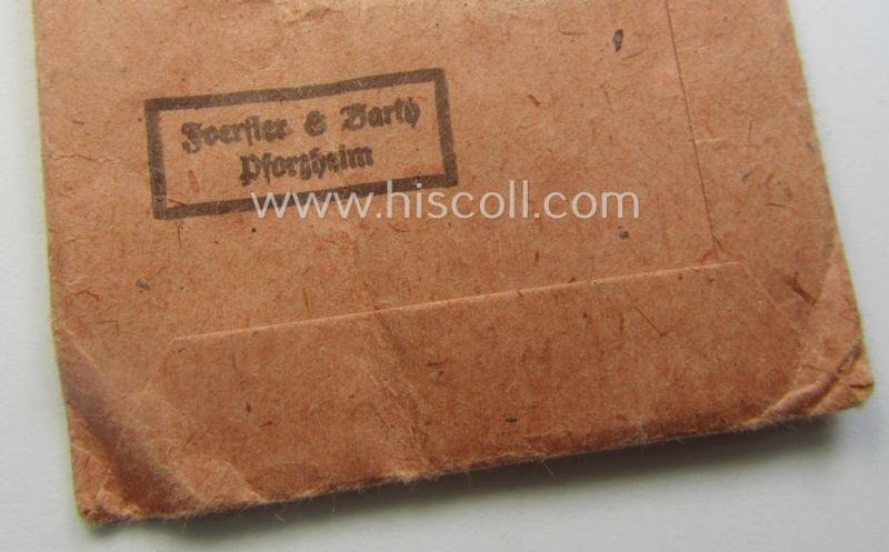 Medal-set: 'Winterschlacht im Osten 1941/42' as produced by the: 'Förster & Barth'-company being a clearly maker- (ie. '10'-marked) specimen that came stored in its original 'Zellstoff'-based pouch of issue as found — image 6