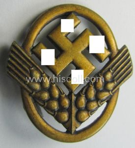Bright-golden-toned - and I deem aluminium-based - cap-badge (ie. 'Hutabzeichen') …