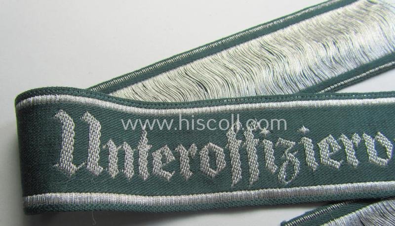 Superb example of an - actually scarcely encountered! - WH (Heeres) linnen-based cuff-title (ie. 'Ärmelstreifen') entitled: 'Unteroffiziervorschule' (as was executed in so-called: 'flat-wire'-style- ie. 'BeVo-weave'-pattern) — image 2