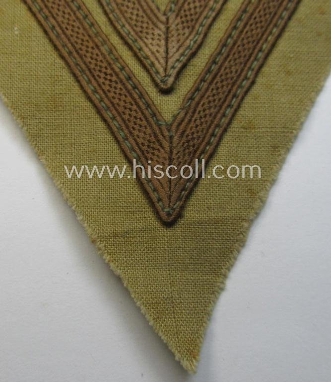 WH (Luftwaffe) tropical-styled, 'Armwinkel' (or: arm-chevron) as executed on typical beige- ie. tan-coloured linnen as was specifically intended for usage by a soldier with the rank of an: 'Obergefreiter' — image 2