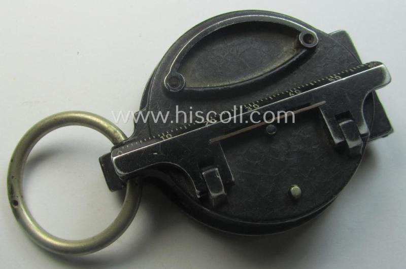 Pre-war-period, 'standard-issue'-pattern and/or (typical) black-coloured (and/or aluminium-based) WH compass (ie. 'Marschkompass') which is nicely maker- (ie. 'Busch - D.R.G.M.'-) marked and/or individually numbered: '106302' — image 3