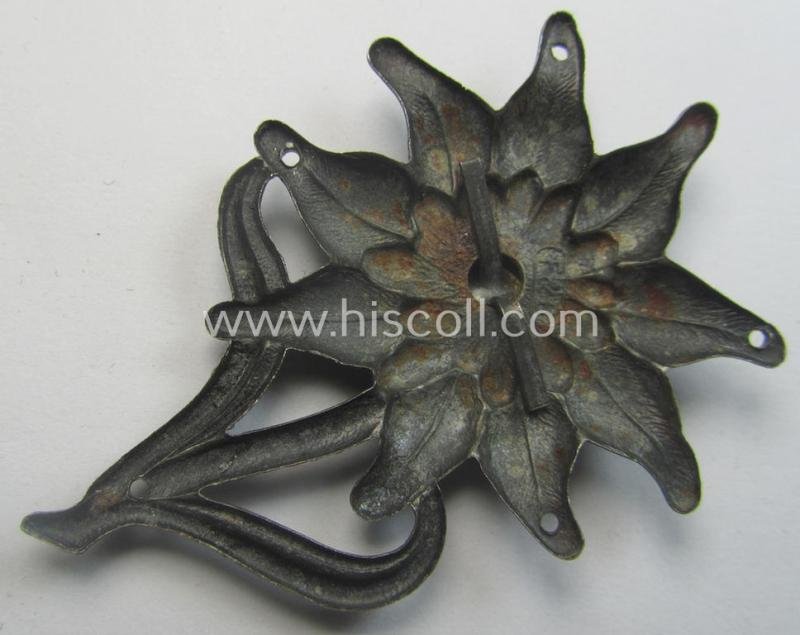 WH (Heeres) (darkened) silverish- (ie. golden-) coloured, zinc-based (and neatly maker- ie. 'F&B'-marked) so-called: 'M43'-pattern 'Edelweiss'-cap-badge (ie. 'Mützenabzeichen') — image 2