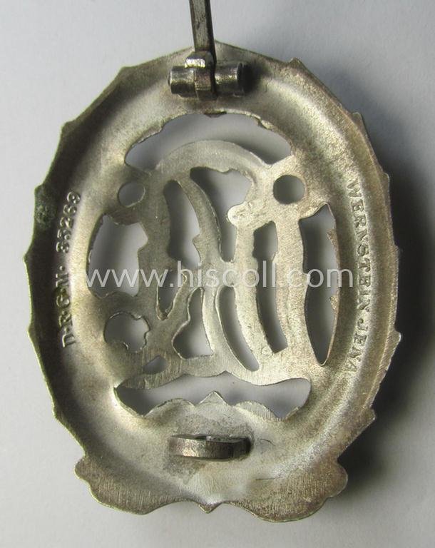 'Virtually mint' example of a: 'Reichssportabzeichen DRL in Silber' (or: DRL sports'-badge in silver) being a just moderately worn- ie. used example that is nicely maker- (ie. 'Wernstein - Jena'-) marked on its back — image 3