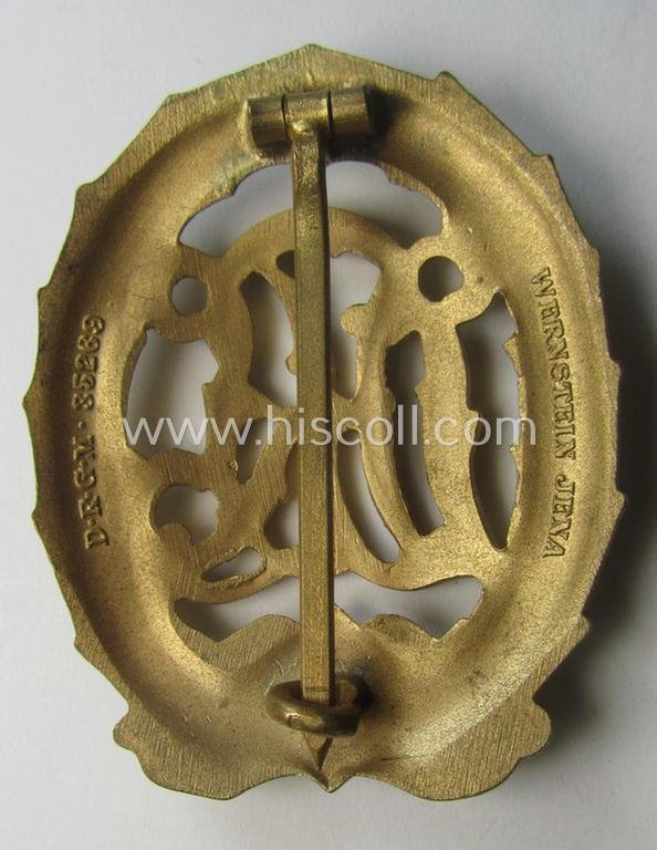 'Virtually mint' - and truly rarely found! - example of a: 'Reichssportabzeichen DRL in Gold' (or: DRL sports'-badge in gold) being a just moderately worn- ie. used example that is nicely maker- (ie. 'Wernstein - Jena'-) marked on its back — image 2
