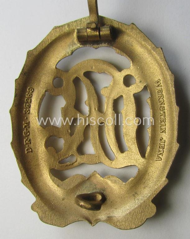 'Virtually mint' - and truly rarely found! - example of a: 'Reichssportabzeichen DRL in Gold' (or: DRL sports'-badge in gold) being a just moderately worn- ie. used example that is nicely maker- (ie. 'Wernstein - Jena'-) marked on its back — image 3