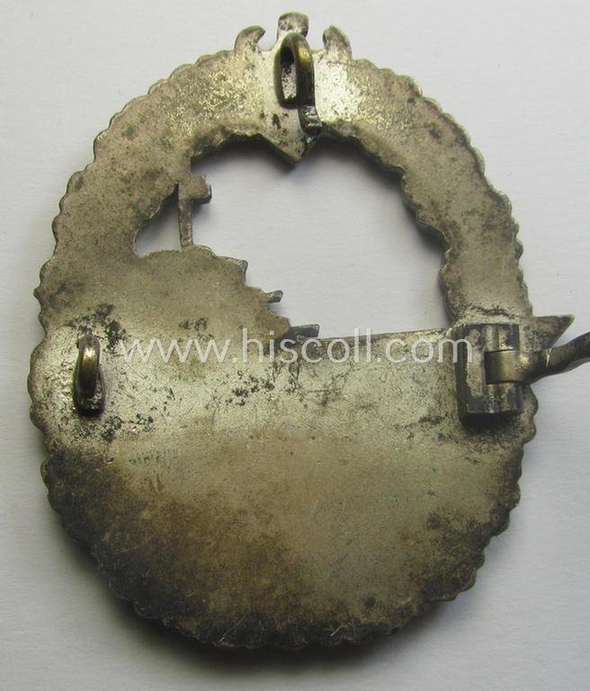 WH (Kriegsmarine) 'Zerstörerkriegsabzeichen' being a non-maker-marked example as executed in 'Buntmetall' (ie. 'Tombak') as was (I deem) produced by the desirable maker (ie. 'Hersteller'): 'GWL' (ie. 'Gebr. Wegerhoff') — image 5