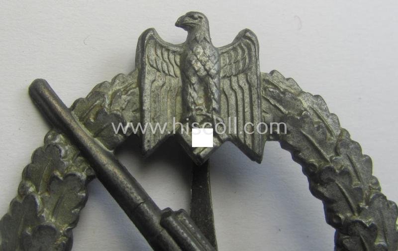 WH (Kriegsmarine) 'Marine-Artillerie-Abzeichen' being a typical zinc- (ie. 'Feinzink'-) based example by the desirable maker- (ie. 'Hersteller') 'C.E. Juncker - Berlin' — image 2