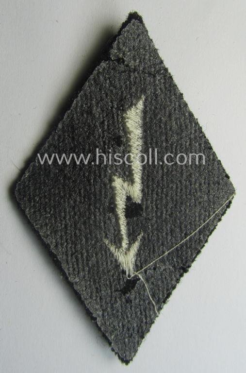 Waffen-SS-pattern, machine-embroidered and black-coloured sleeve-insignia (ie. 'Ärmelraute') depicting a: 'Signalblitz' ('SS-Nachrichten-Trpn.') — image 2
