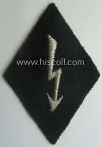 Waffen-SS-pattern, machine-embroidered and black-coloured sleeve-insignia (ie. 'Ärmelraute') depicting a: 'Signalblitz' …