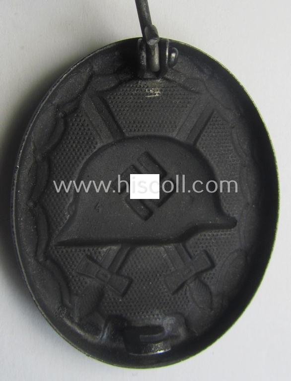 Black-class wound-badge (or: 'Verwundeten-Abzeichen in Schwarz') being a maker- (ie. '4'-) marked specimen as was produced by the maker (ie. 'Hersteller') named: 'Steinhauer & Lück' — image 2