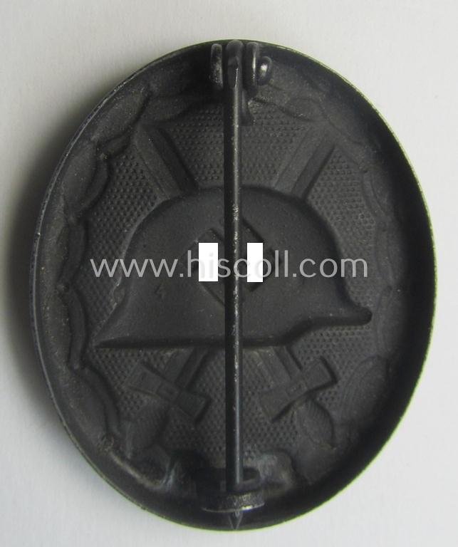 Black-class wound-badge (or: 'Verwundeten-Abzeichen in Schwarz') being a maker- (ie. '4'-) marked specimen as was produced by the maker (ie. 'Hersteller') named: 'Steinhauer & Lück' — image 3