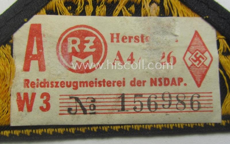 'HJ' ('Hitlerjugend') district-triangle (ie. 'Gebietsdreieck') entitled: 'Reichs-deutsche Jugend Ausland' being a 'virtually mint- ie. unissued' specimen that retains its 'RzM'-etiket — image 3
