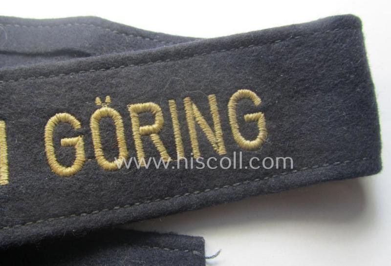 Typical 'smooth-woolen'-based, enlisted-mens'- (ie. NCO-) pattern WH (Luftwaffe) cuff-title (ie. 'Ärmelstreifen') entitled: 'Hermann Göring' (being an I deem presumably issued- albeit never worn nor tunic-attached and minimally damaged example) — image 3