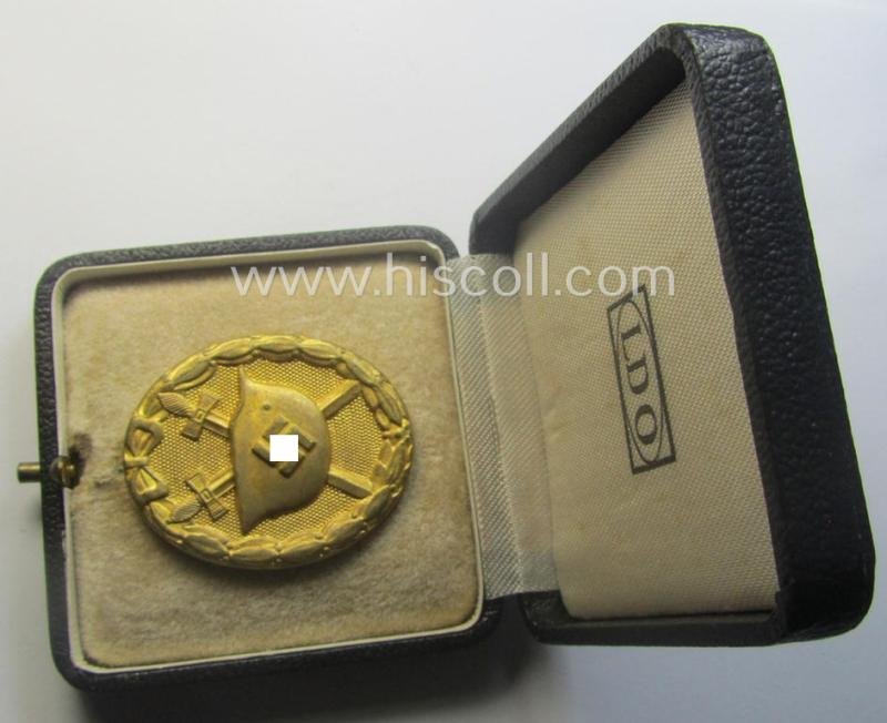 Rarely encountered 'Verwundeten-Abzeichen in Gold' being a clearly maker- (ie. 'L/11'- by 'Wilh. Deumer') marked- and typical 'Buntmetall'-based example that comes stored in its period- (and LDO-marked!) etui — image 2