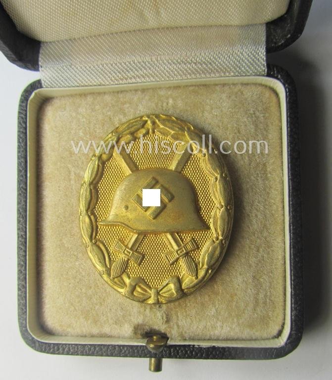 Rarely encountered 'Verwundeten-Abzeichen in Gold' being a clearly maker- (ie. 'L/11'- by 'Wilh. Deumer') marked- and typical 'Buntmetall'-based example that comes stored in its period- (and LDO-marked!) etui — image 3