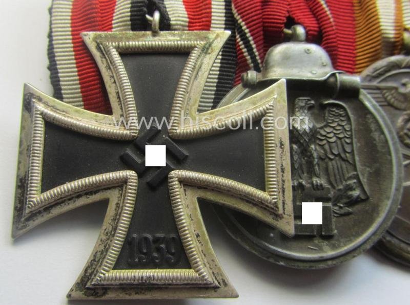4-pieced, WWII-period medal-bar (ie. 'Ordenspange') showing resp. an: 'EKII.Kl.', a: 'Medaille Winterschlacht im Osten 1941-42' a: 'KvKII.Kl. m. Schw.', a: 'Westwall'-medal and 'Kriegsverdienstmed. 1939' — image 2