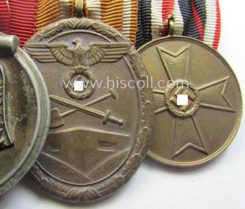 4-pieced, WWII-period medal-bar (ie. 'Ordenspange') showing resp. an: 'EKII.Kl.', a: 'Medaille Winterschlacht im Osten 1941-42' a: 'KvKII.Kl. m. Schw.', a: 'Westwall'-medal and 'Kriegsverdienstmed. 1939' — image 3