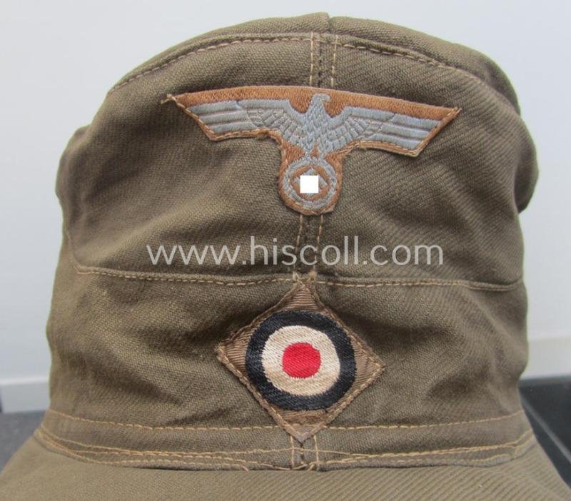 WH (Heeres), 'M41-pattern', tropical-issued field-cap (ie.: 'Tropen-Einheitsfeldmütze') being an (approx.) 57-cms.-sized example that is totally void of a makers'-, date- nor size-designation and that comes in a moderately worn- ie. used, condition — image 2