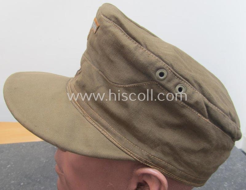 WH (Heeres), 'M41-pattern', tropical-issued field-cap (ie.: 'Tropen-Einheitsfeldmütze') being an (approx.) 57-cms.-sized example that is totally void of a makers'-, date- nor size-designation and that comes in a moderately worn- ie. used, condition — image 4