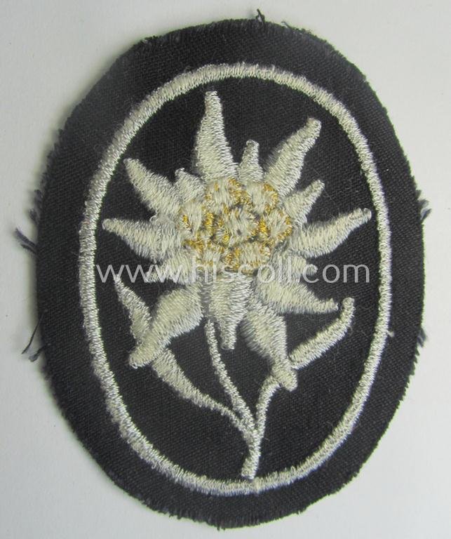 Waffen-SS-pattern, black-coloured sleeve-insignia (ie. 'Ärmelabzeichen') depicting an: 'Edelweiss'-flower as used by the various 'Gebirgsjäger'- (ie. mountain-troops-) related divisional-staff — image 2