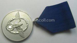 Bright-silver-toned so-called: 'Polizei-Dienstauszeichnung 3. Stufe' (or: police loyal-service medal 3rd …