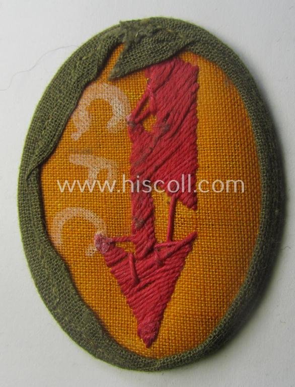 WH (Heeres) 'tropical-styled', trade- and/or special-career insignia (or: 'Signal Blitz') as was intended for a soldier who served within the: 'Pz- o. Panzerjäger-Trpn.' — image 2