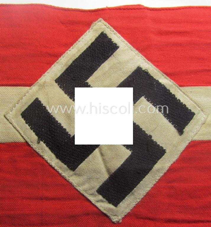 'Standard-issued'-pattern (ie. entirely woven) pattern, bright-red-coloured HJ- (ie. 'Hitlerjugend'-) related armband (ie. 'Armbinde') being a moderately worn- ie. used example that misses its 'RzM'-etiket — image 2