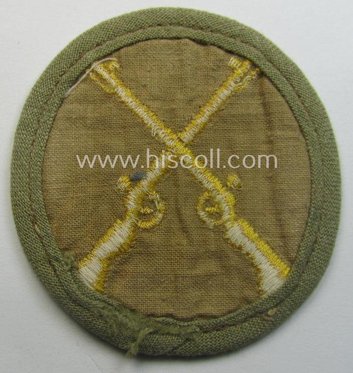 WH (Heeres) 'tropical'-issued, trade- and/or special-career insignia (ie. machine-embroidered 'Laufbahn- o. Tätigkeitsabzeichen') as was intended for an army: 'Waffenmeister' (or: weapon-equipment NCO) — image 2