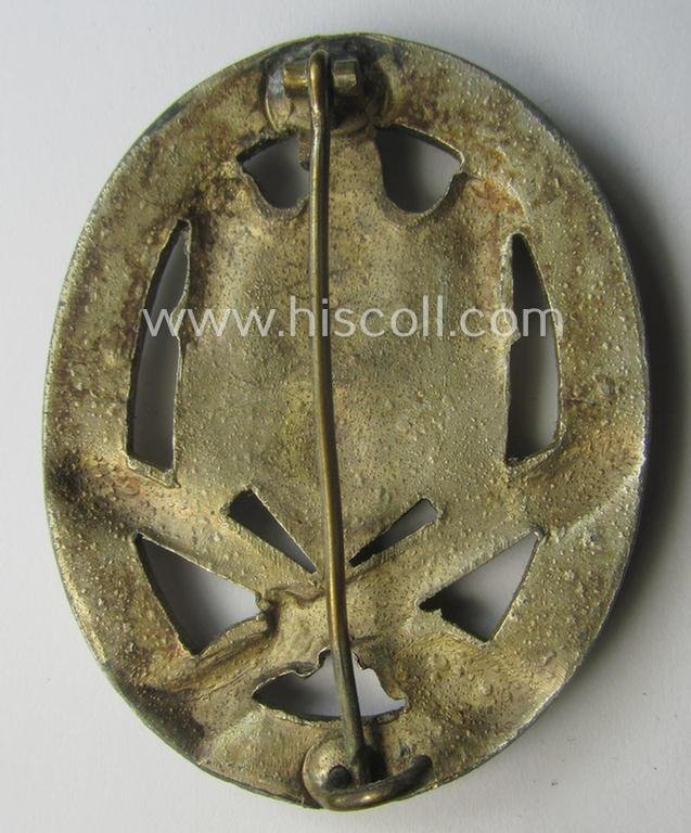 'Allgemeines Sturmabzeichen' (or: General Assault Badge ie. GAB) being a typical unmarked, zinc-based- (ie. 'Feinzink'-) and/or: 'semi-hollow-back'-version as was (I deem) produced by the: 'Rudolf Karneth'-company — image 3