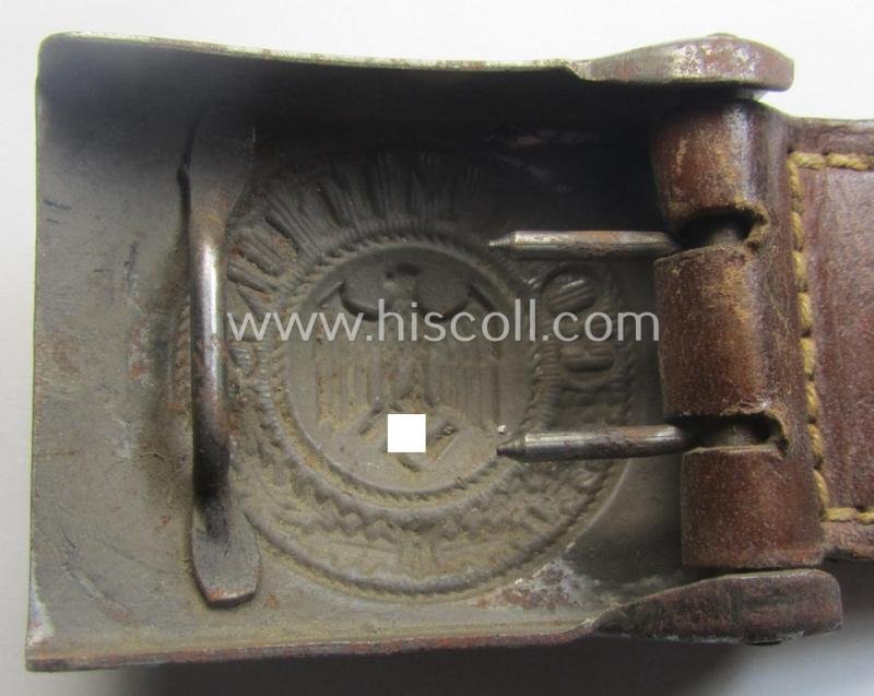 Moderately used, WH (Heeres) field-grey-coloured- and/or steel-based belt-buckle being a non-maker-marked example that comes mounted onto its maker- (ie. 'F.W. Assmann - Lüdenscheid'-) marked and/or '1940'-dated leather-based tab — image 5
