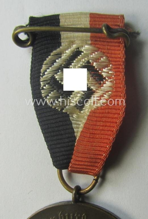 Darker-bronze-toned commemorative-medal (ie. 'Erinnerungs-Medaille') entitled: 'Hindenburg - Hitler - 30.1.1933 - 5.3.1933' and that comes mounted onto its period ribbon showing an interwoven swastika-device — image 2