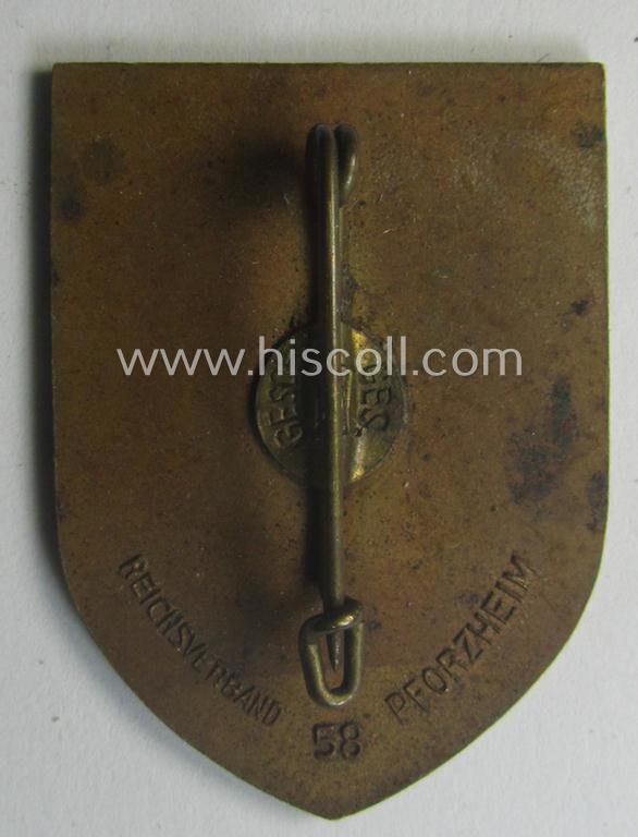 Commemorative, golden-bronze-toned, 'DAF'/'HJ'- (ie. 'Deutsches Arbeits Front o. Hitlerjugend'-) related 'tinnie' being a maker- (ie. 'Reichsverband 58 Pforzheim'-): 'Reichs-Berufs-Wettkampf der deutschen Jugend 1935' — image 2