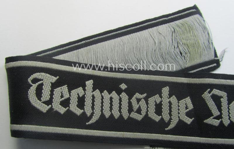 Minimally used and/or carefully tunic-removed, TeNo-cuff-title (ie. 'Ärmelstreifen') entitled: 'Technische Nothilfe' (= 'TeNo') being a full length example as was woven in the neat 'BeVo'-weave pattern — image 2