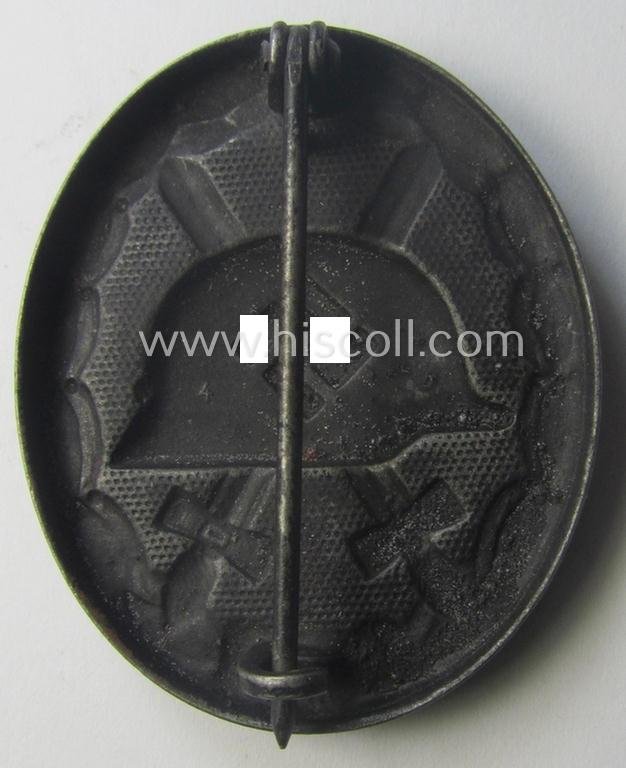 Black-class wound-badge (or: 'Verwundeten-Abzeichen in Schwarz') being a maker- (ie. '4'-) marked specimen as was produced by the maker (ie. 'Hersteller') named: 'Steinhauer & Lück' — image 2