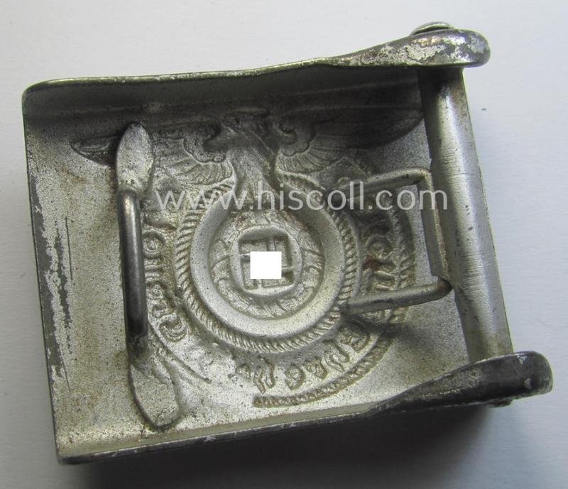 Waffen-SS, EM- (ie. NCO-) type belt-buckle (being a typical, unmarked and typical steel-based: 'Overhoff & Cie'-example) that comes in a surely issued- and/or moderately used- ie. worn, condition — image 2