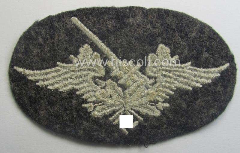 Machine-embroidered WH (Luftwaffe) trade- ie. special-career-patch as was intended for: 'Flak-Artillerie'-staffmembers and that comes in a probably issued but never worn- (ie. 'virtually mint'-), condition — image 2