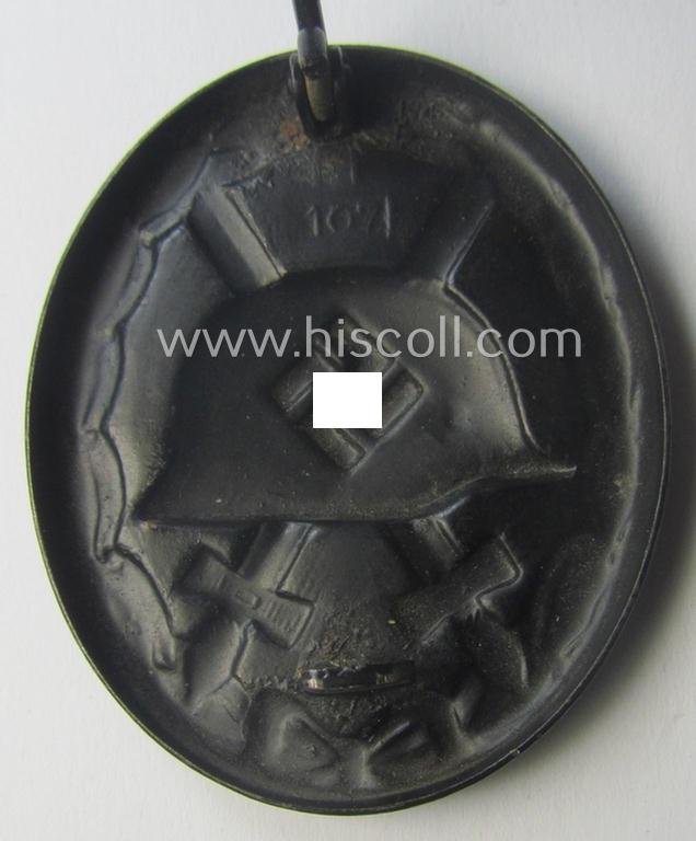 Nicely maker- (ie. '107-) marked example of a black-class wound-badge (or: 'Verwundeten-Abzeichen in Schwarz') being an example that was produced by the maker (ie. 'Hersteller') named: 'Carl Wild' — image 3