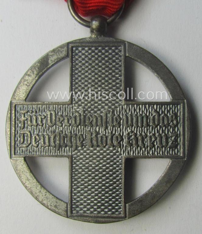 'DRK-Ehrenzeichen des 3. Modell' that comes together with its original (regular-sized- and period-mounted) ribbon (ie. 'Bandabschnitt') as issued and/or stored for decades — image 4