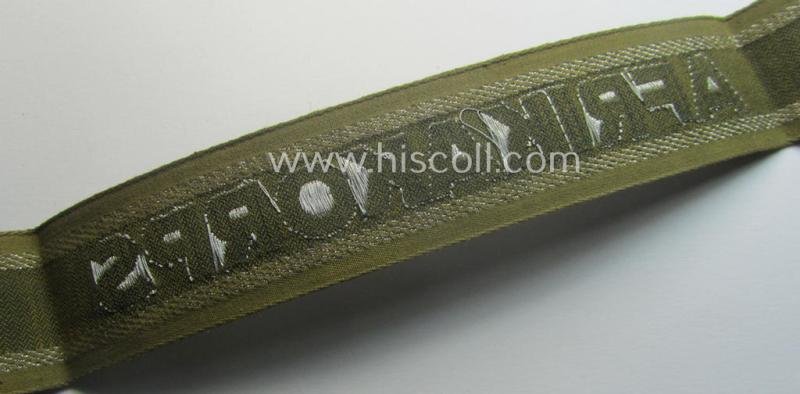 'BeVo'-like cuff-title (ie. 'Ärmelstreifen') entitled: 'Afrikakorps' being a presumably issued but simply never worn example that comes in an overall very nice- (ie. non-shortened- and never tunic-attached-), condition — image 5