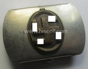 Bright-silver-toned (ie. chromed metal-based) patriotic belt-buckle (ie. N.S.D.A.P.-supportive-piece) that shows …