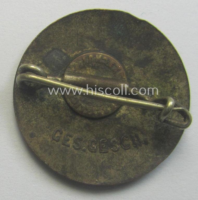 Early-pattern 'N.S.D.A.P. - Parteiabzeichen' showing a (double!) so-called: 'Ges. Gesch.'-patent-pending-designation — image 2