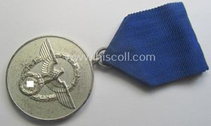 Bright-silver-toned so-called: 'Polizei-Dienstauszeichnung 3. Stufe' (or: police loyal-service medal 3rd …