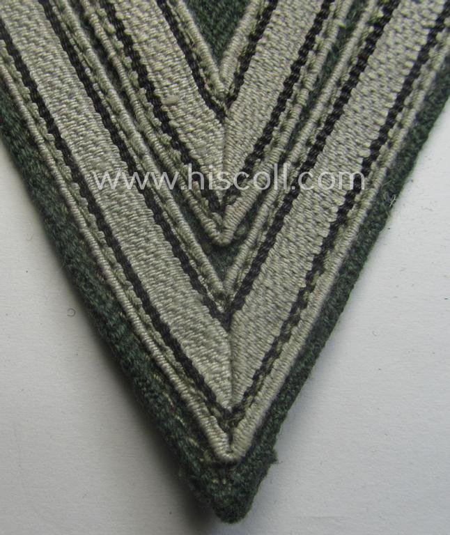WH (Heeres ie. Waffen-SS) 'Armwinkel' (or: arm-chevron) as was executed on a greenish-coloured- and/or 'HBT'-like (ie. 'Drillich'-) based background as was specifically intended for usage by an: 'Obergefreiter' (ie. 'SS-Rottenführer') — image 2