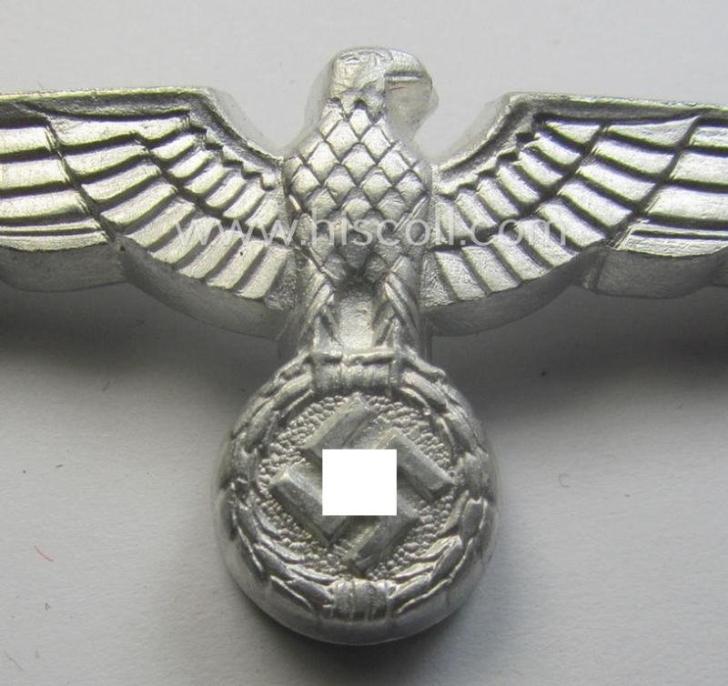 WH (Heeres) bright-silver-toned (ie. aluminium-based), EM- (ie. NCO- or officers') type visor-cap-eagle being a non-maker-marked example that comes in a never used- ie. (I deem) never cap-attached, condition — image 2