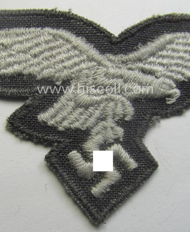 'Variant'-pattern WH (Luftwaffe) EM- (ie. eventually NCO-) type side-cap eagle (being a 'virtually mint- ie. unissued' example as executed in typical machine-embroidered-pattern onto an unusally seen 'thin-shaped'-background) — image 2