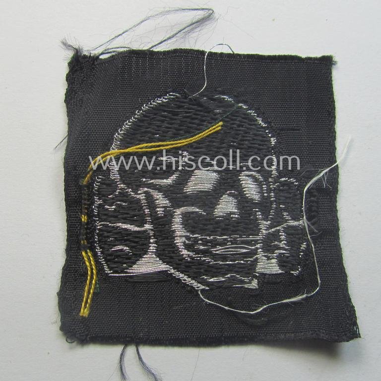 Stunning - and rarely encountered! - Waffen-SS, officers'-pattern, 'BeVo-flatwire'-woven-style skull (ie. 'Totenkopf für Offz.-Schiffchen o. Einheitsfeldmütze') that comes in a never used- (ie. still 'virtually mint ie. unissued'-), condition — image 2