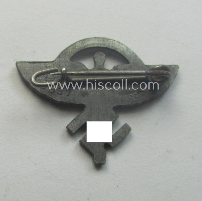 N.S.F.K.- (or: 'National Socialistisches Flieger Korps'-) related civil-attire badge (ie. 'Zivilabzeichen') being a neat maker- (ie. 'GB'- ie. '9837'-) marked example that is bearing a patent-pending- (ie. 'Ges.Gesch.'-) designation on its back — image 2