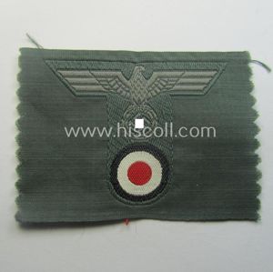 WH (Heeres) 'T-shaped' M42-model cap-eagle/cocarde as executed in 'BeVo'-weave pattern …